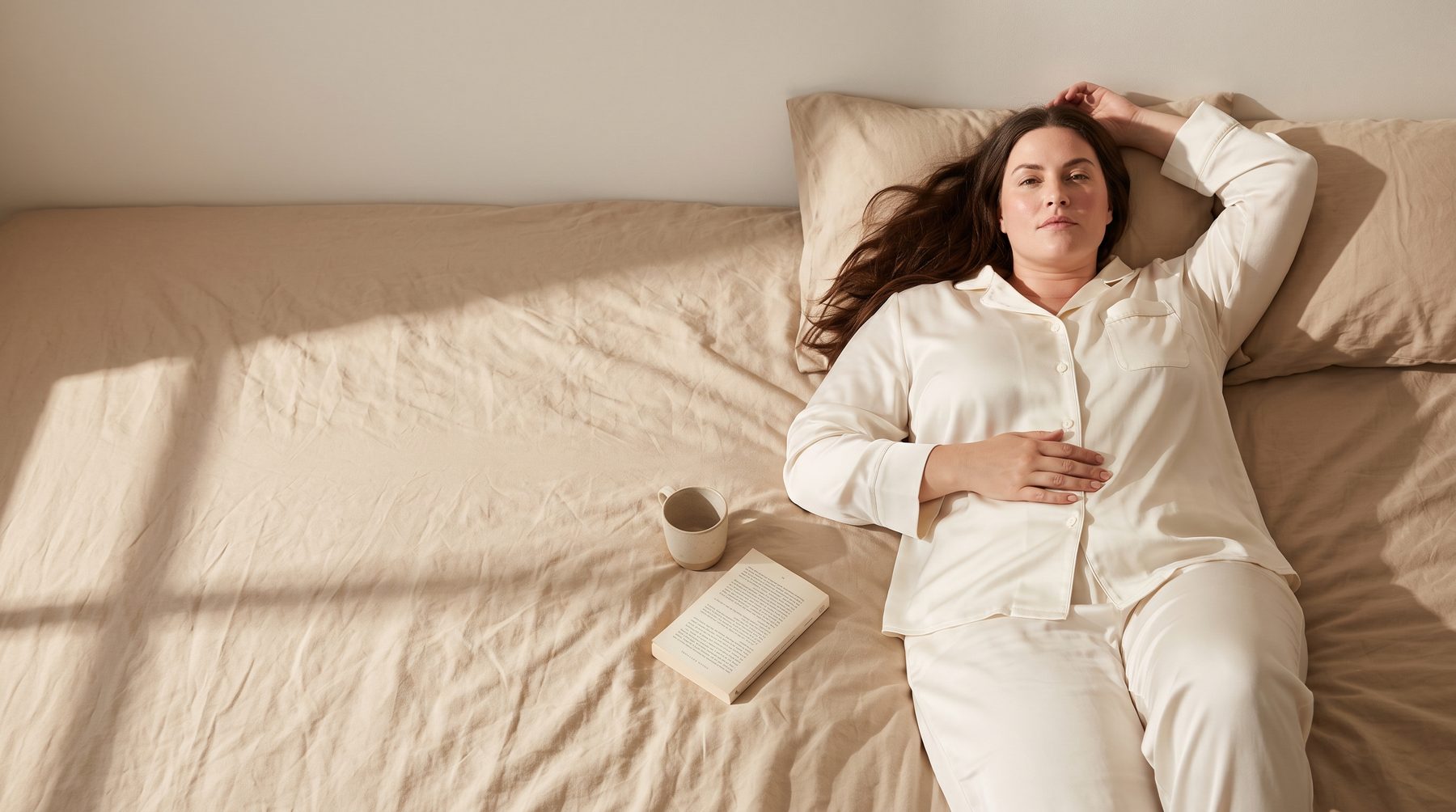 Woman relaxing in loungewear, morning light